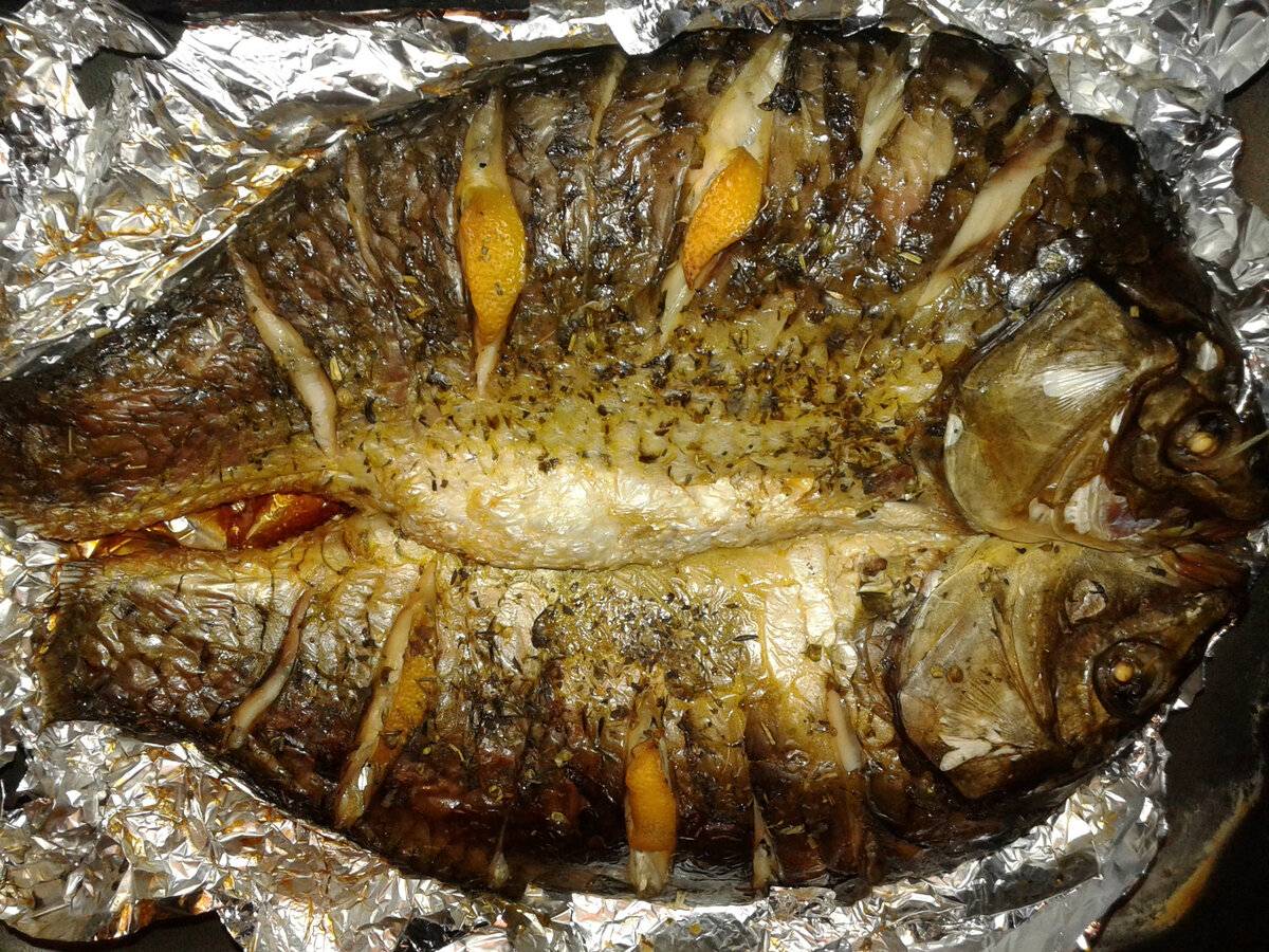 Как в духовке приготовить рыбу в фольге в духовке рецепт с фото